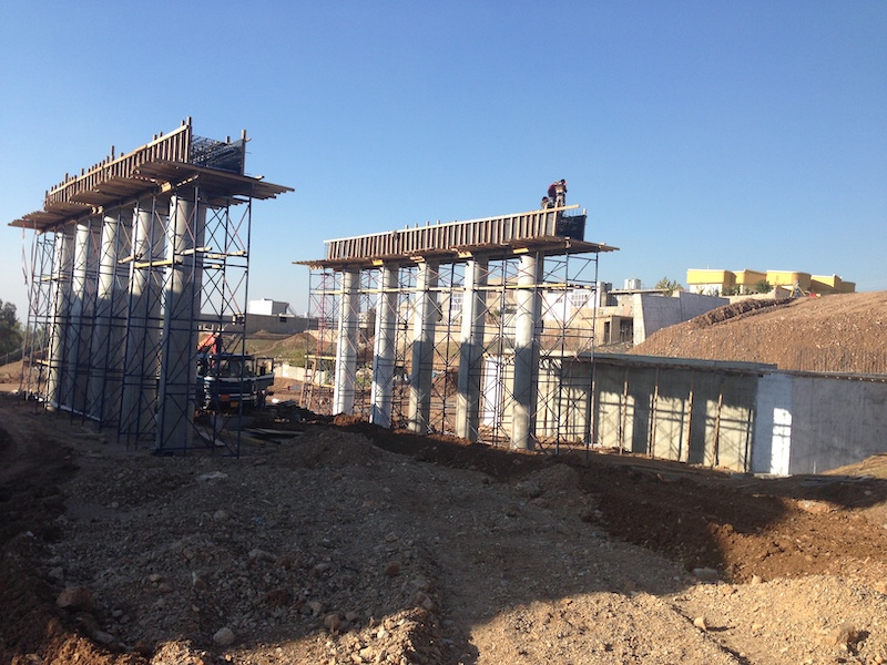 Construction of Bridge and Sewerage Water and Road